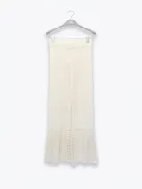 Pantalón italiano tejido en 100% algodón, color crudo, con punto abierto en la parte inferior y corte estilo Oxford.