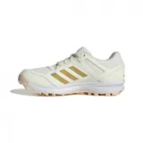 Championes Adidas Fabela Rise color crema con detalles dorados y suela color durazno, diseñados para hockey.