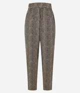 Pantalón fluido de cintura alta confeccionado en crepé con elástico y lazo en la cintura, bolsillos, recortes y estampado de lunares diferenciado.