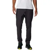 Pantalón de trekking color beige, con tecnología Omni-Shield de repelencia al agua y Omni-Shade de protección solar UPF 50. Cuenta con elástico parcial en la cintura, bolsillos para las manos, bolsillo de seguridad con cremallera y bolsillos traseros.