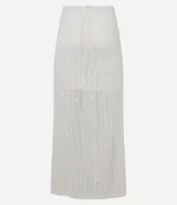 Pollera de largo new midi confeccionada en tejido de punto con aplicación de lentejuelas en toda la prenda. Presenta un diseño ajustado al cuerpo, forro interno y cintura elástica.