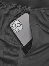Short de running Under Armour Launch 7 2N1, color azul con detalles en celeste.