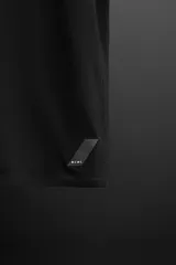 Camiseta blanca de corte holgado, cuello redondo y manga corta. Detalle de logo estampado en el bajo. Zara Athleticz.