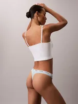 Colaless celeste con cintura elástica blanca con logo Calvin Klein.