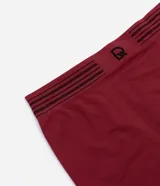 Calzoncillo bóxer blanco de poliamida, con cintura elástica a rayas grises y logo de la marca.