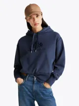 Buzo con capucha azul marino de Tommy Hilfiger, con cordón ajustable, puños y bajo de punto canalé. Logo de Tommy Hilfiger bordado en el pecho y en la manga.