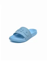 Ojotas tipo slide color rosa con logo Umbro en relieve en la tira.