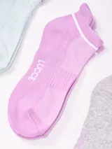 Pack de tres pares de soquetes tobilleros en colores rosa, blanco y naranja, con detalle de una línea horizontal en el borde superior.