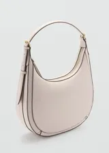 Bolso tipo hobo color rosa claro, con asa de hombro y cierre de cremallera.