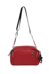 Bandolera color beige con correa ancha negra regulable y llavero de estrella.