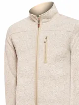 Campera polar color beige jaspeado, con cuello alto, cierre frontal completo y bolsillo vertical con cierre en el pecho.