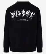 Buzo negro de corte holgado confeccionado en fleece, con cuello redondo, mangas largas y puños ajustados. Estampa frontal con diseño abstracto y texto "Regret Nothing".