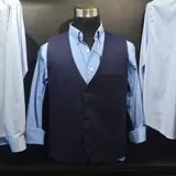 Chaleco azul marino de lana con cuello en V, cierre frontal con botones y bolsillos ribeteados.