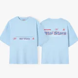 Camiseta celeste con estampado frontal y trasero con el texto "Ittai Stars" en color rojo y azul.