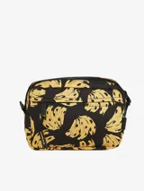 Bolso bandolera negro con estampado de bananas amarillas. Tiene un compartimento principal con cierre de cremallera y correa ajustable para llevar al hombro o cruzado.