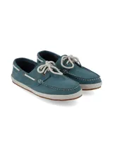 Mocasines náuticos de cuero azul marino con cordones marrones, ojales metálicos y suela de yute.