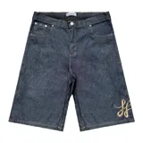 Jort (pantalón corto ancho y largo) de algodón felpa, color negro, con tiro medio y bolsillos delanteros y traseros.