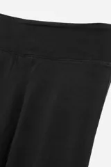 Calza legging color negro, de algodón y elastano.