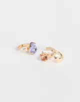 Set de tres earcuffs dorados con strass multicolor.