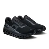 Championes de running On Cloudmonster 2, color negro con detalles en gris.