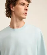 Remera relaxed de algodón con efecto grueso, color azul marino, cuello redondo y manga corta.