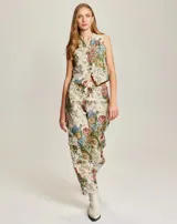 Chaleco de jacquard con estampado floral, escote en V pronunciado y cierre frontal con botones.