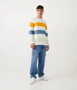 Suéter de punto de algodón con rayas horizontales en blanco, amarillo, azul y verde.