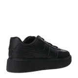 Zapatillas deportivas color beige con plataforma marrón y detalles en negro.