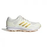 Championes Adidas Fabela Rise color crema con detalles dorados y suela color durazno, diseñados para hockey.