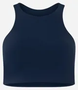 Top deportivo ajustado color malva, con escote halter y espalda nadador.