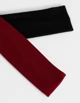 Set de dos vinchas anchas de jersey, una color rojo y otra color marrón.