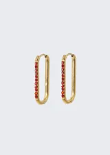 Aros de bisagra con zirconias rojas en acero quirúrgico hipoalergénico, con largo de 22 mm.