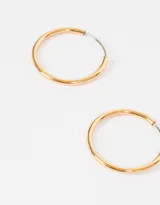 Par de aros tipo argolla bañados en oro.