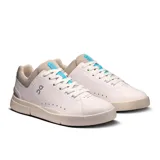 Championes urbanos de cuero sintético color blanco hueso, con detalles en beige y celeste.