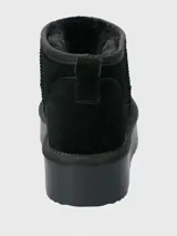 Bota corta color marrón claro de cuero con plataforma y forro de poliéster.