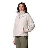 Chaleco acolchado Columbia Heavenly II para mujer, color negro, con forro termorreflectante Omni-Heat™, cuello de felpa forrado de vellón, cierre frontal de dos vías, bolsillos laterales con cremallera y bolsillo interior de seguridad.