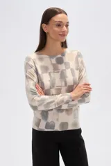 Sweater de manga larga con cuello redondo y estampado animal print abstracto en tonos blanco y marrón/malva.