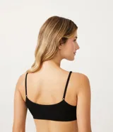Soutien negro sin costuras, con relleno removible y tirantes finos.