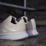 Championes de running Adidas Duramo SL 2 color beige con detalles plateados.