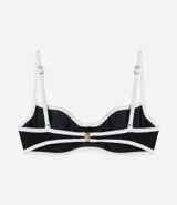 Top de bikini negro con detalle de bies blanco contrastante, de microfibra, con tirantes ajustables y cierre en la espalda.