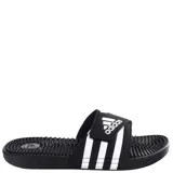 Chanclas Adidas Adissage negras con rayas blancas y plantilla con puntos de masaje.