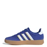 Championes urbanos Adidas Barreda, color azul con detalles en blanco y amarillo.