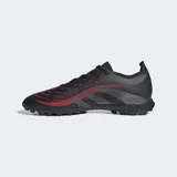 Championes de fútbol Adidas Predator League Turf, color negro con detalles en gris y rojo. Diseñados para césped artificial, con parte superior Hybridfeel con textura 3D y aletas Strikescale para control del balón.