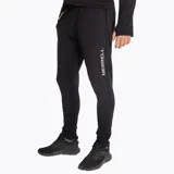 Calzas deportivas negras de poliéster y spandex, ajustadas al cuerpo, con interior suave al tacto, tela delgada y elástica, secado rápido y detalles reflectivos.
