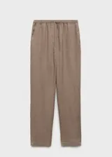 Pantalón de lino color beige, de corte recto, con cintura elástica ajustable con cordón.