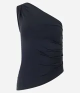 Blusa de jersey color negro con escote de un solo hombro, con franzidos laterales y bajo asimétrico.