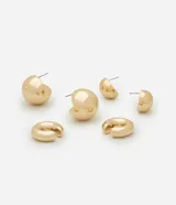 Kit de tres aros dorados: un aro orgánico, un aro bold y un piercing bold.