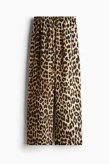Pantalón de sarga suave con estampado de leopardo, tiro alto, elástico revestido y cordón para ajustar en la cintura, piernas rectas con puño en el bajo.