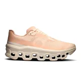 Championes de running On Cloudmonster Void, color salmón con suela blanca y tecnología CloudTec.