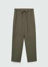 Pantalón fluido color verde militar, de corte recto, con cintura elástica ajustable con cordón y bolsillos laterales.